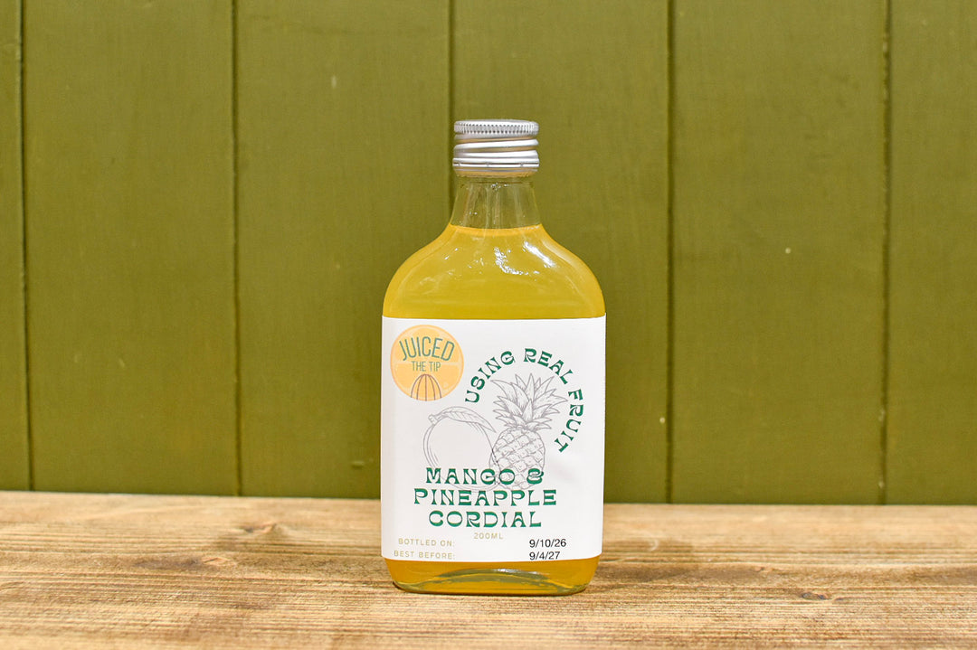 200ml glass bottle of Juiced the Tip Mango and Pineapple natural cordial
